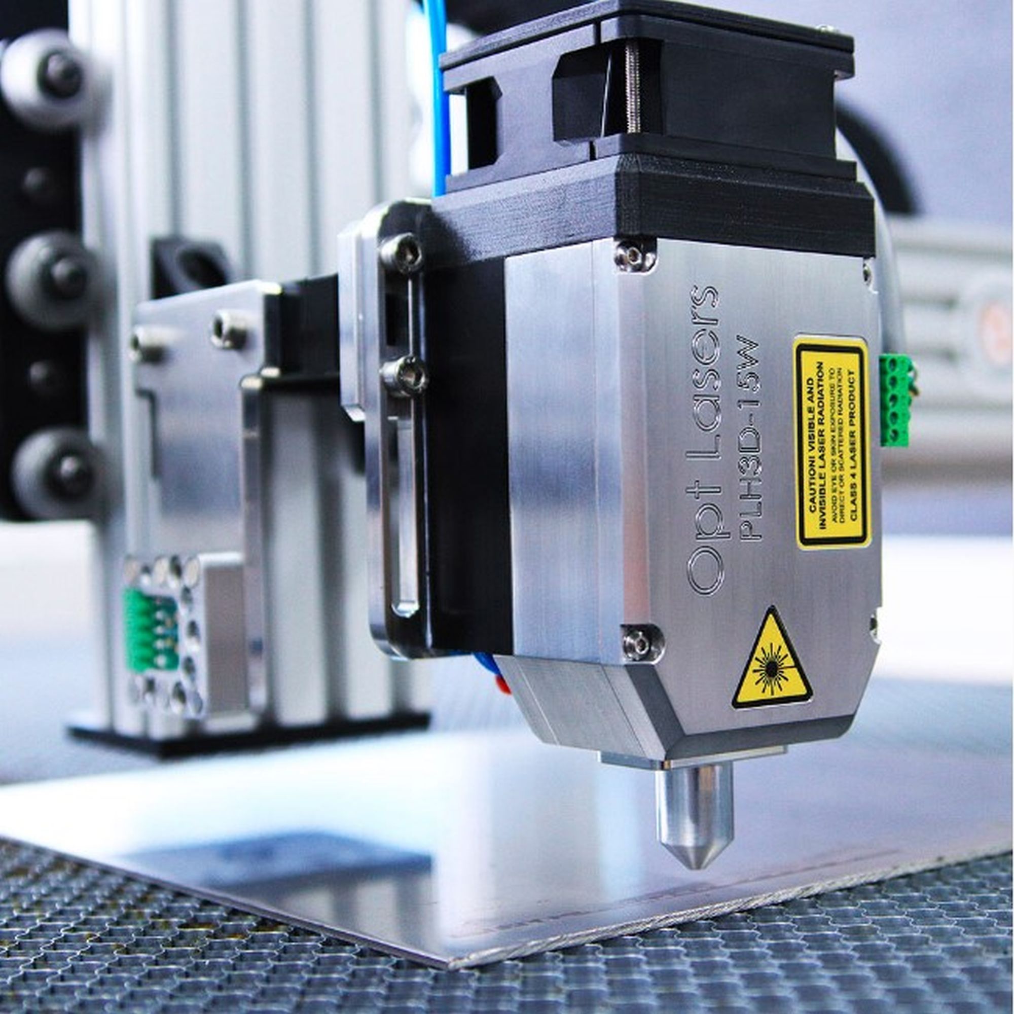 Close-up of an industrial laser marking head